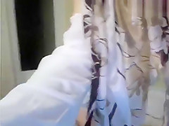MadlenSmit slowly undresses and shows her tits