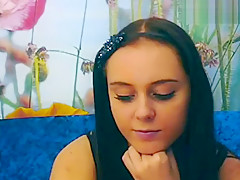 Sexy brunette masturbating on the sofa