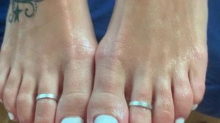 Footjob with cum at her tits
